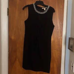 Black Sleeveless Dress with Embellished Neckline